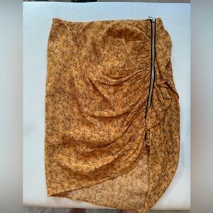 Veronica Beard yellow skirt with the zipper detailing on the side